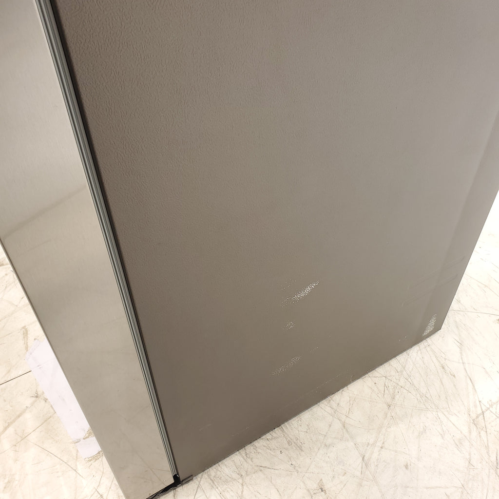 Pictures of Fingerprint Resistant Stainless Steel ENERGY STAR Samsung 27.4 cu. ft. Side by Side Refrigerator with Exterior Water and Ice Dispenser - Scratch & Dent - Moderate - Neu Appliance Outlet - Discount Appliance Outlet in Austin, Tx