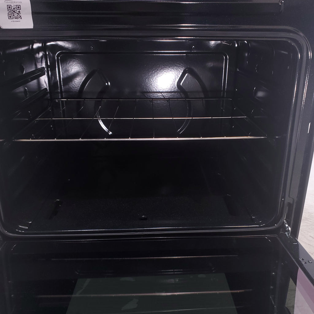 Pictures of Whirlpool Stainless 5.1 Cu. Ft. Freestanding Gas Range with Broiler Drawer and Two Speed Heat Burners - Scratch & Dent - Minor - Neu Appliance Outlet - Discount Appliance Outlet in Austin, Tx