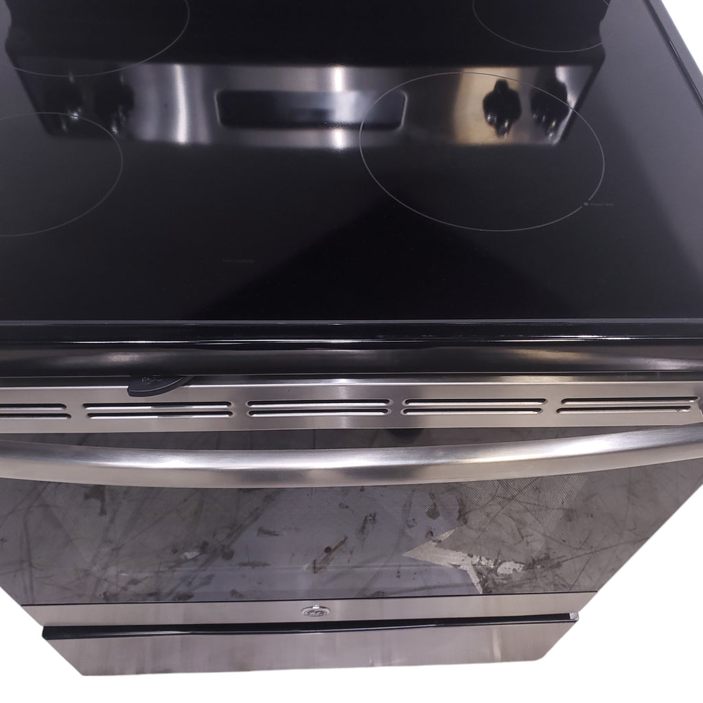 Pictures of GE Stainless Steel & Black Free-Standing Electric Range with 8" Power Boil Element - Certified Refurbished - Neu Appliance Outlet - Discount Appliance Outlet in Austin, Tx