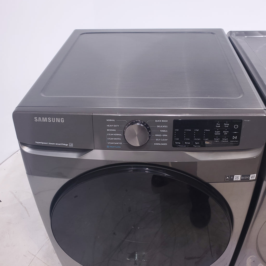 Pictures of Platinum ENERGY STAR Samsung 4.5 cu. ft. Front Load Washer with WiFi Connectivity and Platinum Samsung 7.5 cu. ft. Front Load Electric Dryer with Steam - Scratch and Dent - Minor - Neu Appliance Outlet - Discount Appliance Outlet in Austin, Tx