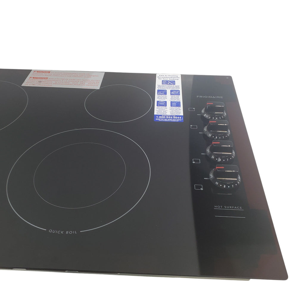 Pictures of Frigidaire Black Drop-in 30" Electric Cooktop with Quick Boil Element an SpaceWise Expandable Element - Open Box - Neu Appliance Outlet - Discount Appliance Outlet in Austin, Tx
