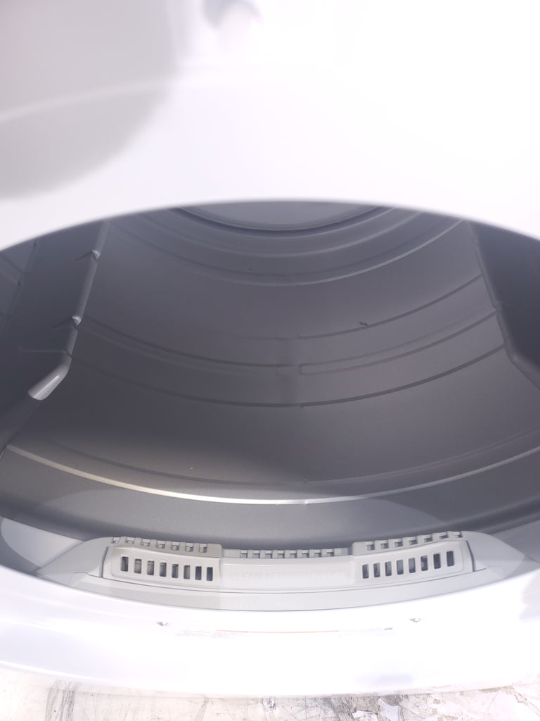 Pictures of ENERGY STAR LG 4.5 cu. ft. Front Load Washing Machine with Steam and ENERGY STAR LG 7.4 cu. ft. Electric Vented Dryer with Sensor Dry and SmartThinQ Technology - Scratch & Dent - Minor - Neu Appliance Outlet - Discount Appliance Outlet in Austin, Tx