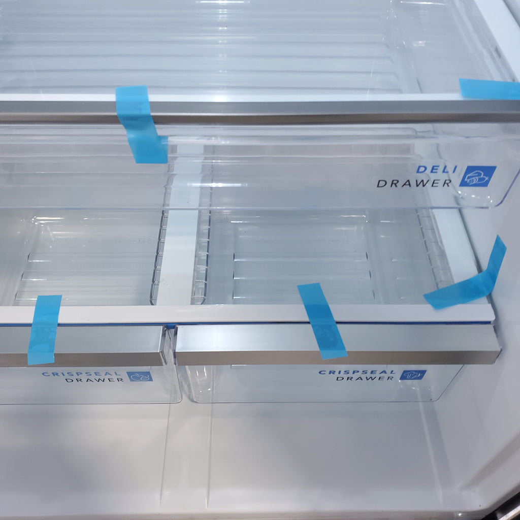 Pictures of 30"  Wide Stainless Steel Frigidaire 18.3 cu. ft. Top Freezer Refrigerator with EvenTemp Cooling System - Scratch & Dent - Moderate - Neu Appliance Outlet - Discount Appliance Outlet in Austin, Tx