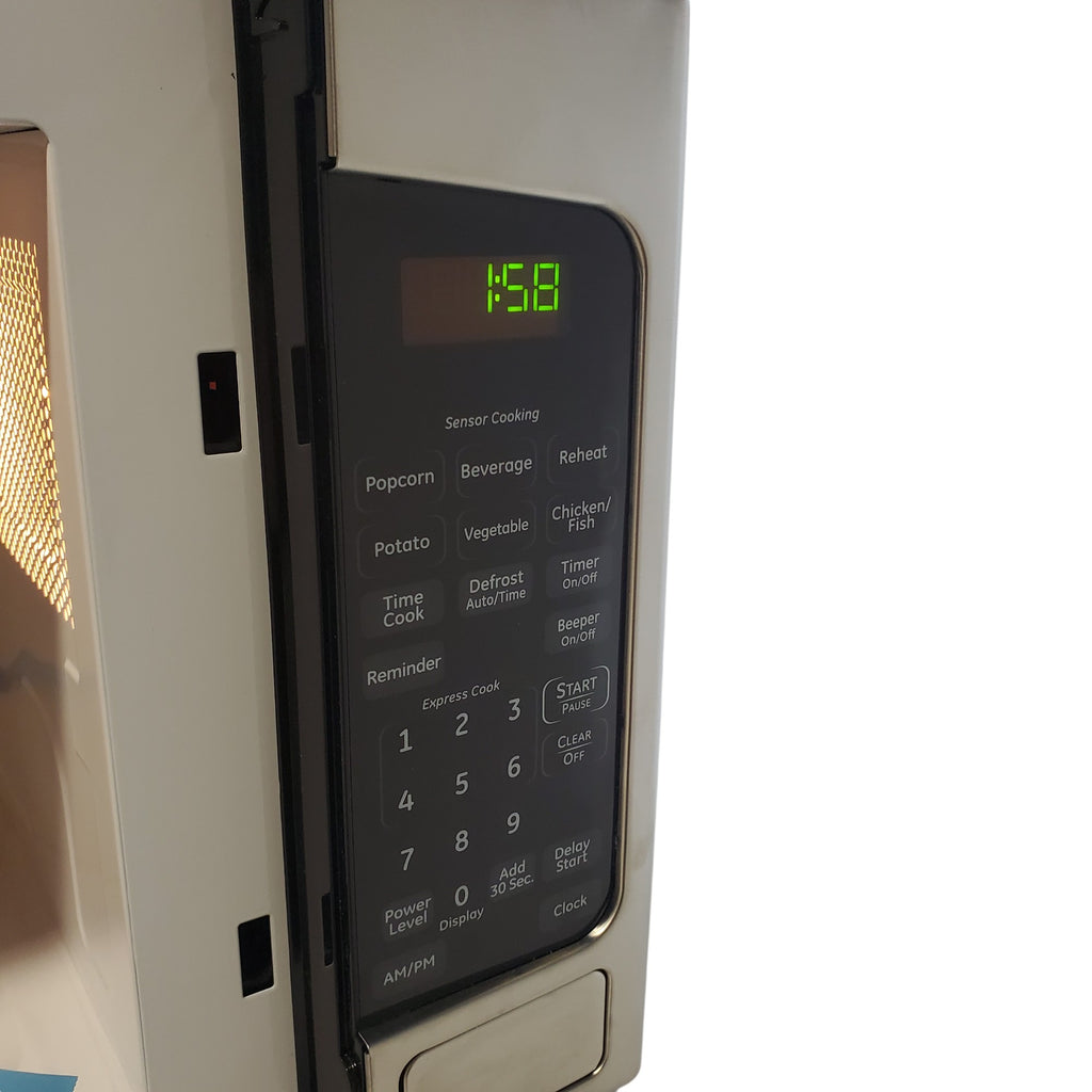 Pictures of Stainless Steel GE 2.0 cu. ft. Countertop Microwave Oven with Sensor Cooking Controls - Scratch & Dent - Minor - Neu Appliance Outlet - Discount Appliance Outlet in Austin, Tx