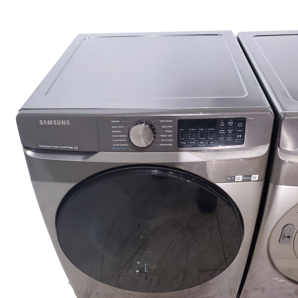 Pictures of Platinum ENERGY STAR Samsung 4.5 cu. ft. Front Load Washer with WiFi Connectivity and Platinum Samsung 7.5 cu. ft. Front Load Electric Dryer with Steam - Scratch and Dent - Minor - Neu Appliance Outlet - Discount Appliance Outlet in Austin, Tx