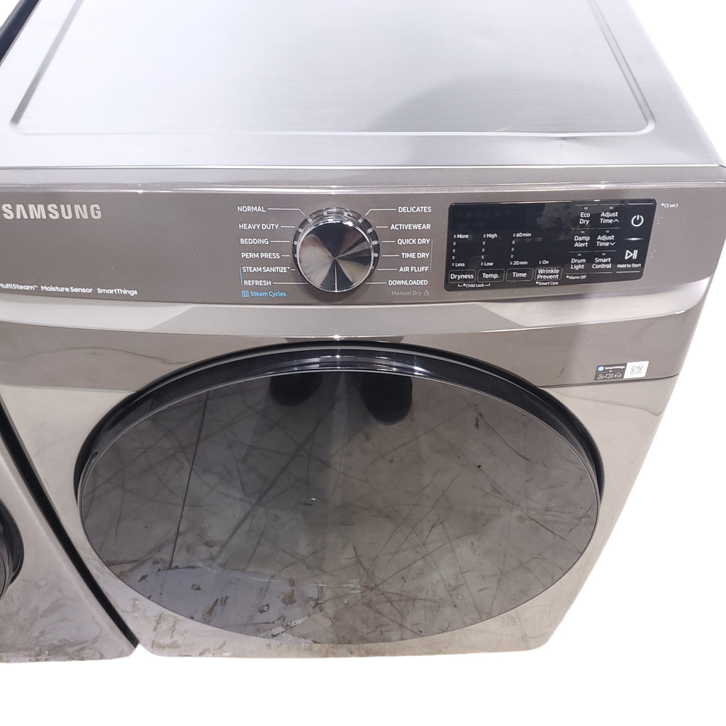Pictures of Platinum ENERGY STAR Samsung 4.5 cu. ft. Front Load Washer with WiFi Connectivity and Platinum Samsung 7.5 cu. ft. Front Load Electric Dryer with Steam - Scratch and Dent - Minor - Neu Appliance Outlet - Discount Appliance Outlet in Austin, Tx