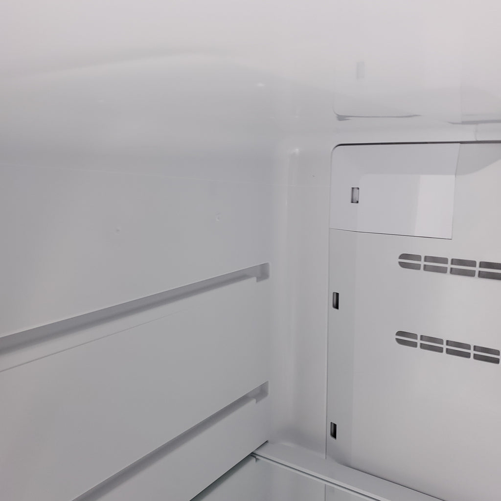 Pictures of 30 in. Wide EasyCare Stainless Steel Frigidaire 20.0 cu. ft. Top Freezer Refrigerator with EvepTemp Cooling System and Ice Maker- Scratch & Dent - Minor - Neu Appliance Outlet - Discount Appliance Outlet in Austin, Tx