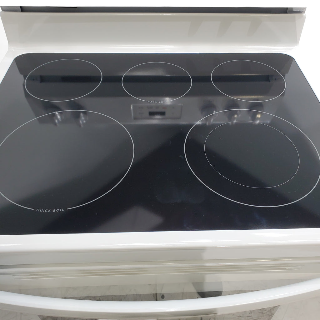 Pictures of Frigidaire White 30 inch 5.3 cu. ft. 5-Burner Element Electric Range with Manual Clean FCRE3052AW - Scratch & Dent - (Minor) - Neu Appliance Outlet - Discount Appliance Outlet in Austin, Tx