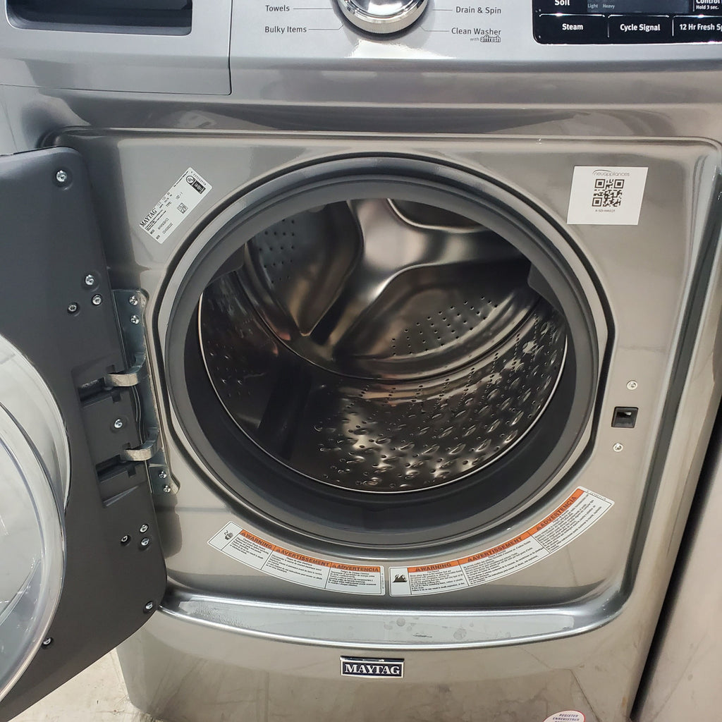 Pictures of Maytag Metallic Slate 4.5-cu ft High Efficiency ENERGY STAR Stackable Steam Cycle Front-Load Washer with Maytag® Commercial Technology and Maytag 7.3-cu ft Stackable Vented ENERGY STAR Electric Dryer - Scratch & Dent - Minor - Neu Appliance Outlet - Discount Appliance Outlet in Austin, Tx