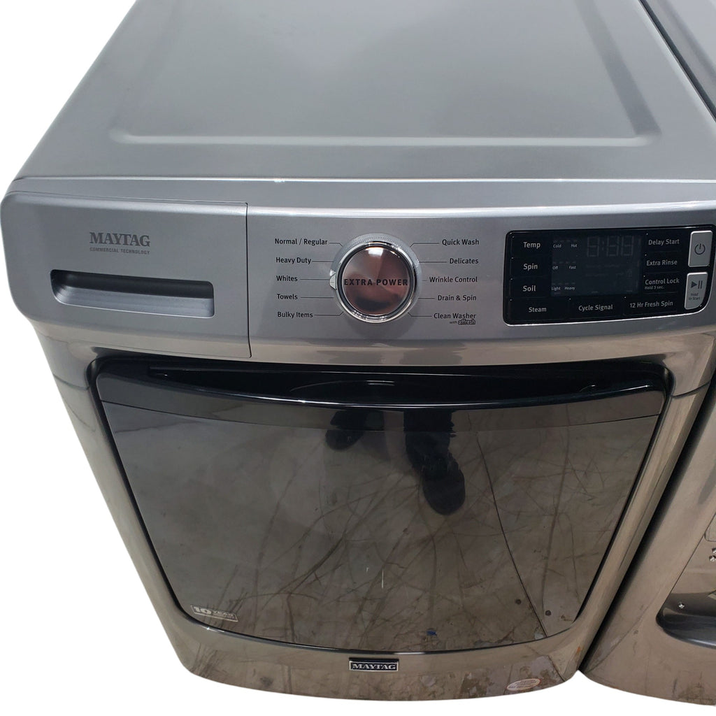 Pictures of Maytag Metallic Slate 4.5-cu ft High Efficiency ENERGY STAR Stackable Steam Cycle Front-Load Washer with Maytag® Commercial Technology and Maytag 7.3-cu ft Stackable Vented ENERGY STAR Electric Dryer - Scratch & Dent - Minor - Neu Appliance Outlet - Discount Appliance Outlet in Austin, Tx
