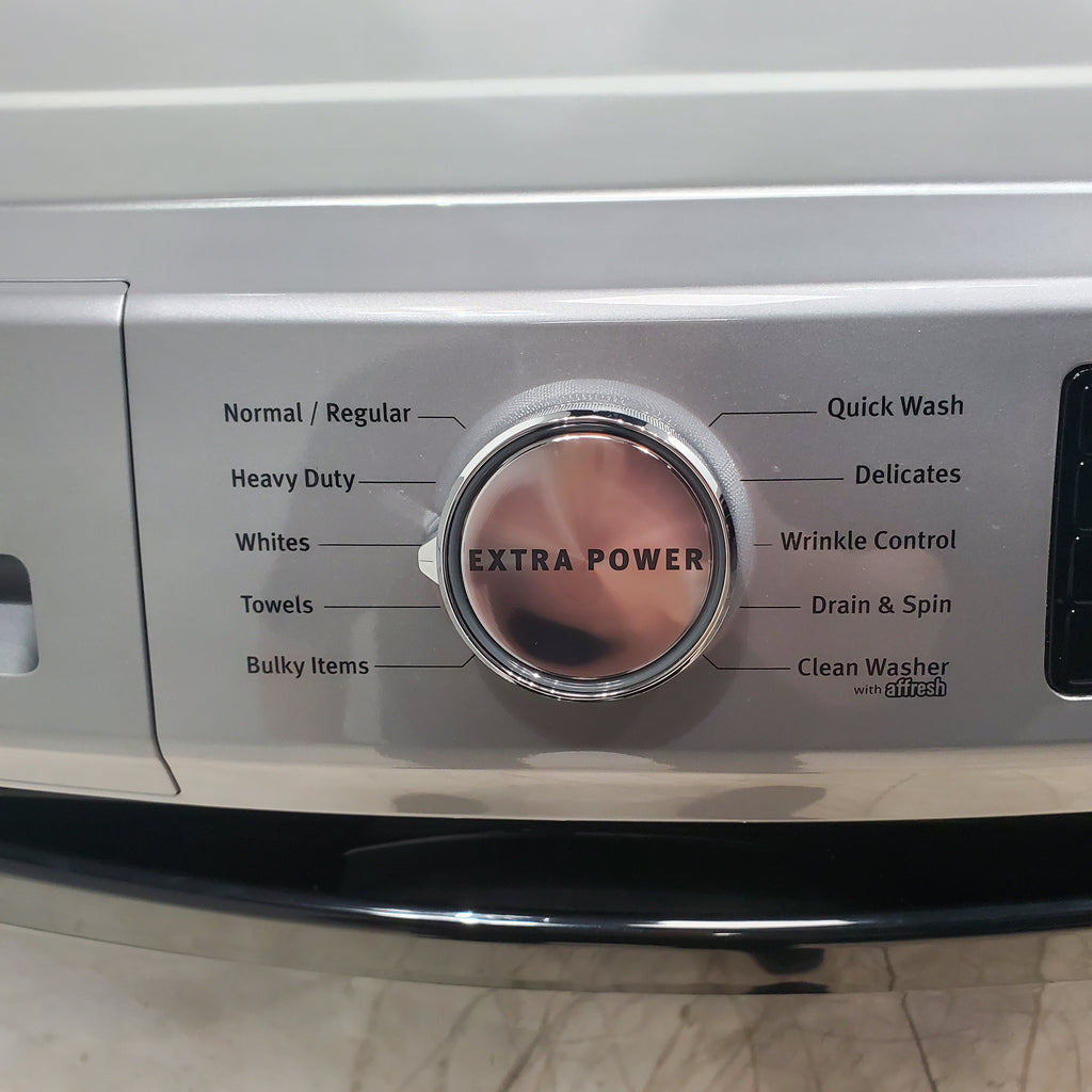 Pictures of Maytag Metallic Slate 4.5-cu ft High Efficiency ENERGY STAR Stackable Steam Cycle Front-Load Washer with Maytag® Commercial Technology and Maytag 7.3-cu ft Stackable Vented ENERGY STAR Electric Dryer - Scratch & Dent - Minor - Neu Appliance Outlet - Discount Appliance Outlet in Austin, Tx