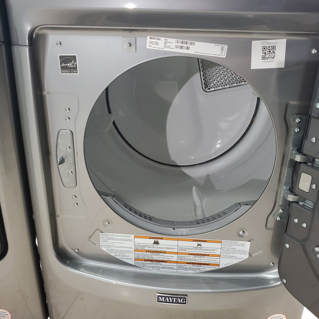 Pictures of Maytag Metallic Slate 4.5-cu ft High Efficiency ENERGY STAR Stackable Steam Cycle Front-Load Washer with Maytag® Commercial Technology and Maytag 7.3-cu ft Stackable Vented ENERGY STAR Electric Dryer - Scratch & Dent - Minor - Neu Appliance Outlet - Discount Appliance Outlet in Austin, Tx