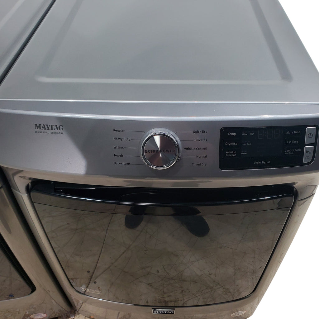 Pictures of Maytag Metallic Slate 4.5-cu ft High Efficiency ENERGY STAR Stackable Steam Cycle Front-Load Washer with Maytag® Commercial Technology and Maytag 7.3-cu ft Stackable Vented ENERGY STAR Electric Dryer - Scratch & Dent - Minor - Neu Appliance Outlet - Discount Appliance Outlet in Austin, Tx