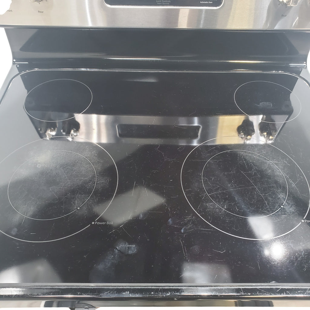 Pictures of Stainless Steel GE 5.3 cu. ft. Freestanding 4 Heating Element Smooth Cooktop Electric Range with Dual Element Baking - Certified Refurbished - Neu Appliance Outlet - Discount Appliance Outlet in Austin, Tx