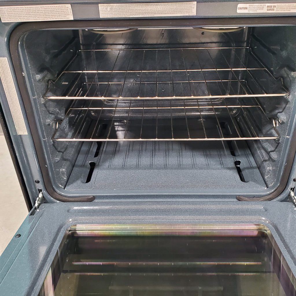 Pictures of Fingerprint Resistant Stainless Steel Whirlpool 5.0 cu. ft. 4 Burner Slide In Gas Range with Frozen Bake Technology - Open Box - Neu Appliance Outlet - Discount Appliance Outlet in Austin, Tx