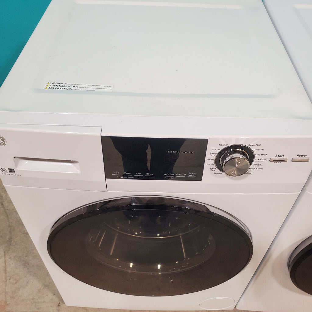Pictures of Compact 24 in. Wide GE ENERGY STAR 2.4 cu. ft. Front Load Steam Washing Machine with 1400 RPM Spin Speed and Frontload Vented WiFi Capable ENERGY STAR 4.3 cu. ft. Electric Dryer with Stainless Steel Basket - Scratch & Dent - Minor - Neu Appliance Outlet - Discount Appliance Outlet in Austin, Tx