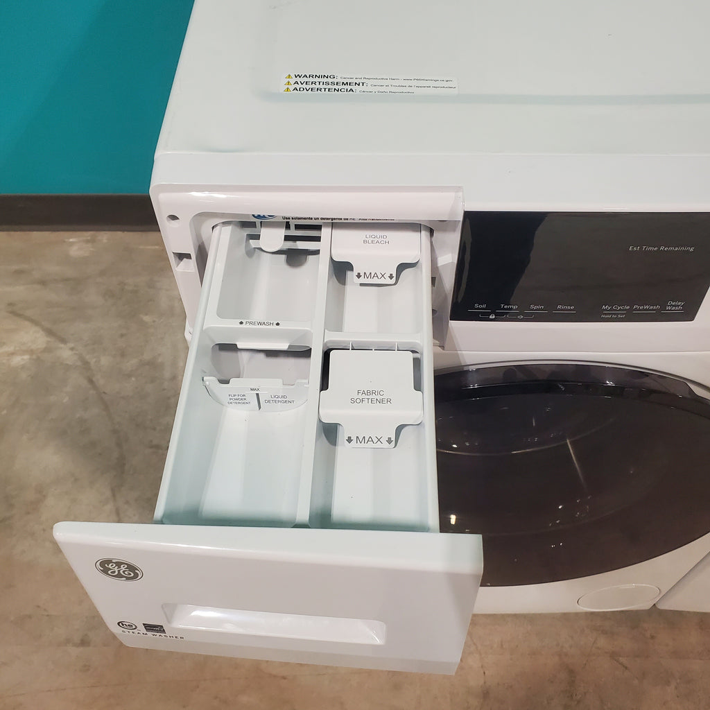 Pictures of Compact 24 in. Wide GE ENERGY STAR 2.4 cu. ft. Front Load Steam Washing Machine with 1400 RPM Spin Speed and Frontload Vented WiFi Capable ENERGY STAR 4.3 cu. ft. Electric Dryer with Stainless Steel Basket - Scratch & Dent - Minor - Neu Appliance Outlet - Discount Appliance Outlet in Austin, Tx