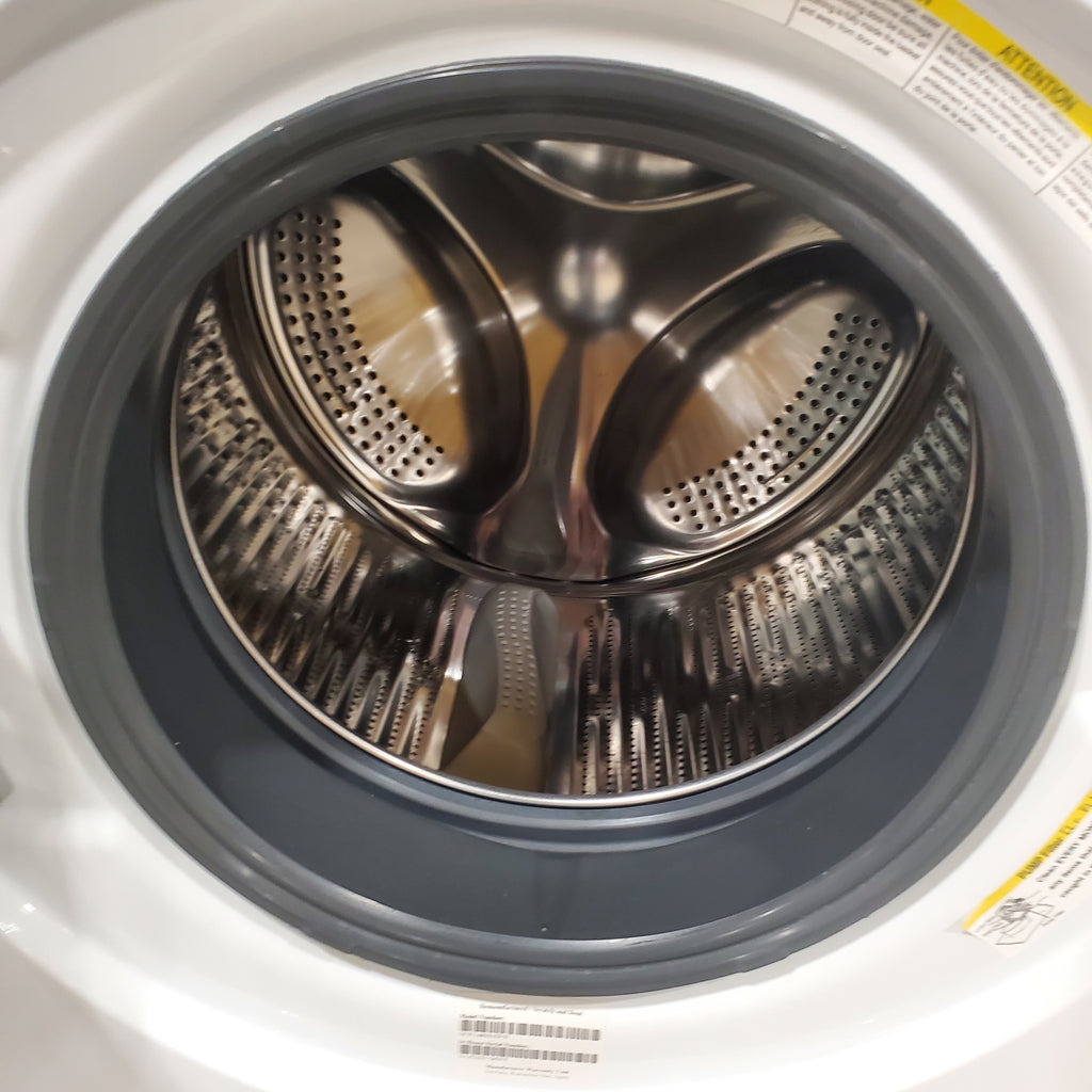 Pictures of Compact 24 in. Wide GE ENERGY STAR 2.4 cu. ft. Front Load Steam Washing Machine with 1400 RPM Spin Speed and Frontload Vented WiFi Capable ENERGY STAR 4.3 cu. ft. Electric Dryer with Stainless Steel Basket - Scratch & Dent - Minor - Neu Appliance Outlet - Discount Appliance Outlet in Austin, Tx