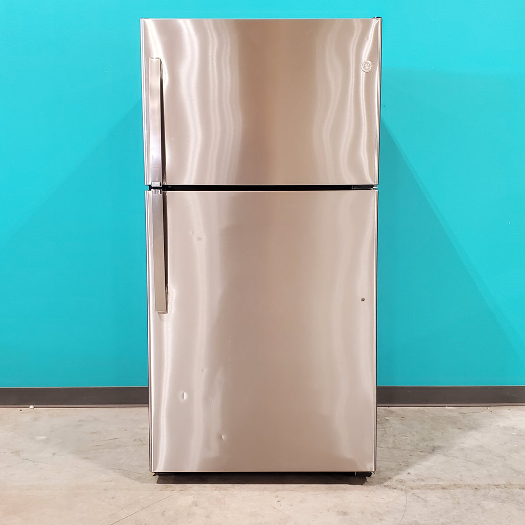 Pictures of Fingerprint Stainless Steel GE 21.9 cu. ft. Top Freezer Refrigerator with Garage Ready Technology GTS22KYNCRFS - Scratch & Dent - Minor - Neu Appliance Outlet - Discount Appliance Outlet in Austin, Tx