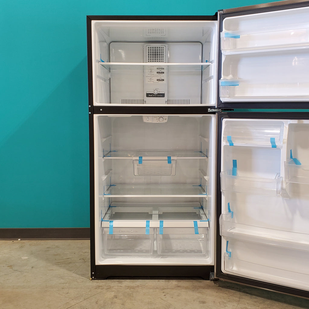 Pictures of Fingerprint Stainless Steel GE 21.9 cu. ft. Top Freezer Refrigerator with Garage Ready Technology GTS22KYNCRFS - Scratch & Dent - Minor - Neu Appliance Outlet - Discount Appliance Outlet in Austin, Tx