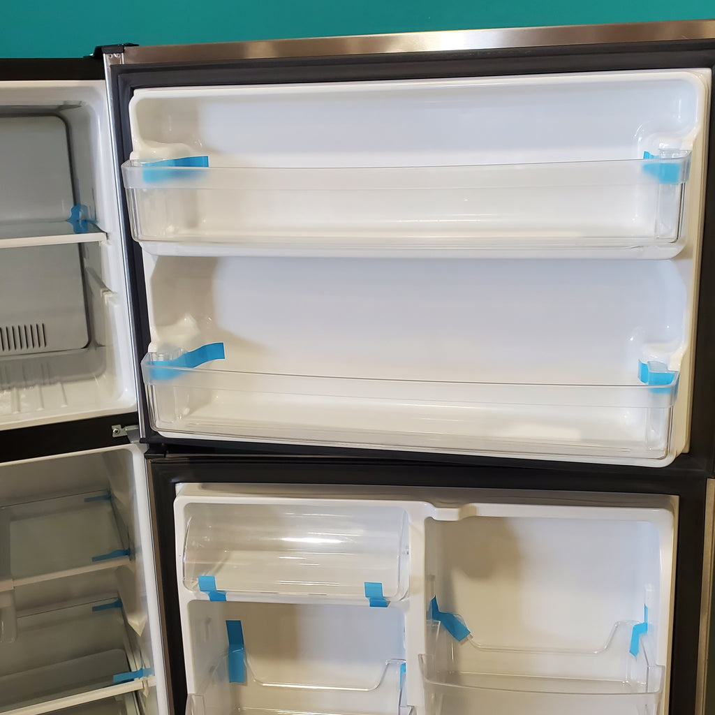 Pictures of Fingerprint Stainless Steel GE 21.9 cu. ft. Top Freezer Refrigerator with Garage Ready Technology GTS22KYNCRFS - Scratch & Dent - Minor - Neu Appliance Outlet - Discount Appliance Outlet in Austin, Tx