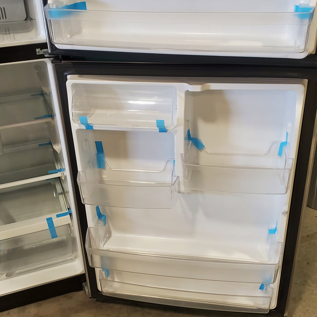 Pictures of Fingerprint Stainless Steel GE 21.9 cu. ft. Top Freezer Refrigerator with Garage Ready Technology GTS22KYNCRFS - Scratch & Dent - Minor - Neu Appliance Outlet - Discount Appliance Outlet in Austin, Tx