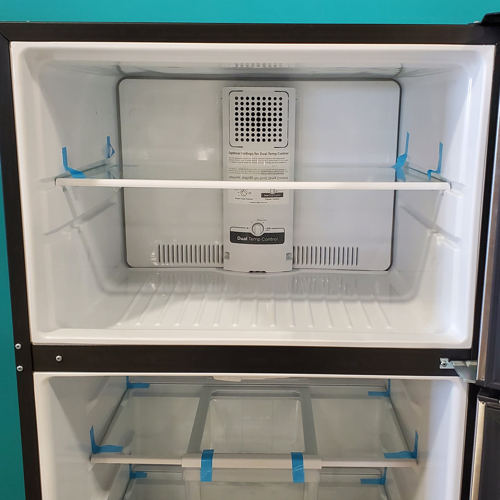 Pictures of Fingerprint Stainless Steel GE 21.9 cu. ft. Top Freezer Refrigerator with Garage Ready Technology GTS22KYNCRFS - Scratch & Dent - Minor - Neu Appliance Outlet - Discount Appliance Outlet in Austin, Tx