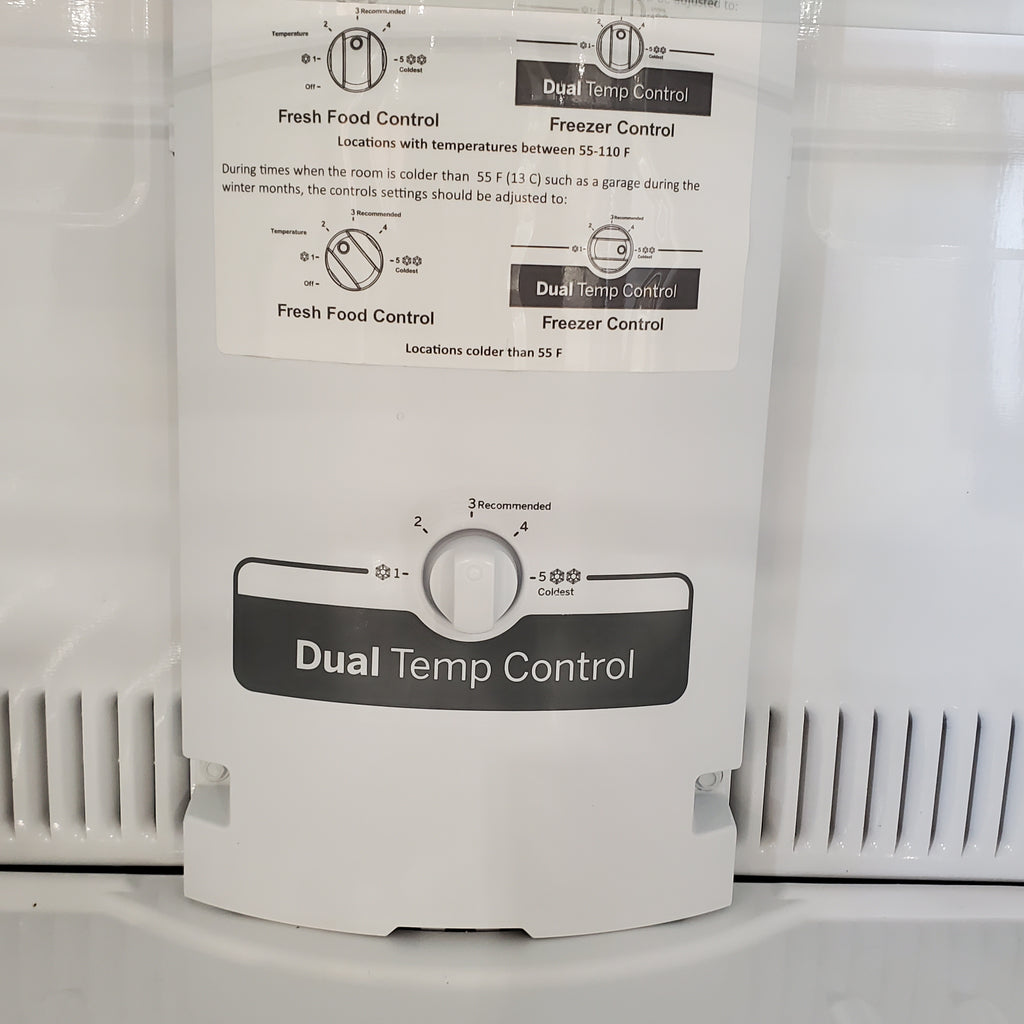 Pictures of Fingerprint Stainless Steel GE 21.9 cu. ft. Top Freezer Refrigerator with Garage Ready Technology GTS22KYNCRFS - Scratch & Dent - Minor - Neu Appliance Outlet - Discount Appliance Outlet in Austin, Tx