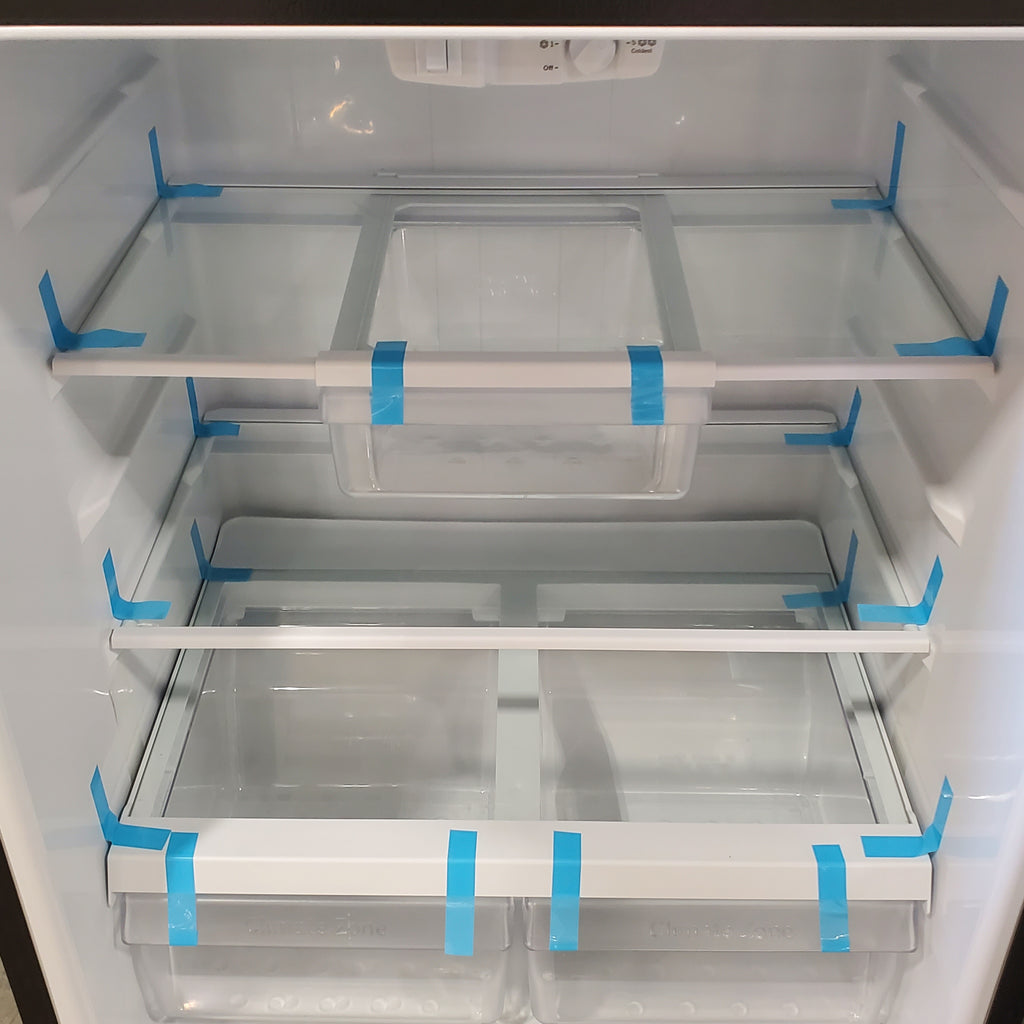 Pictures of Fingerprint Stainless Steel GE 21.9 cu. ft. Top Freezer Refrigerator with Garage Ready Technology GTS22KYNCRFS - Scratch & Dent - Minor - Neu Appliance Outlet - Discount Appliance Outlet in Austin, Tx