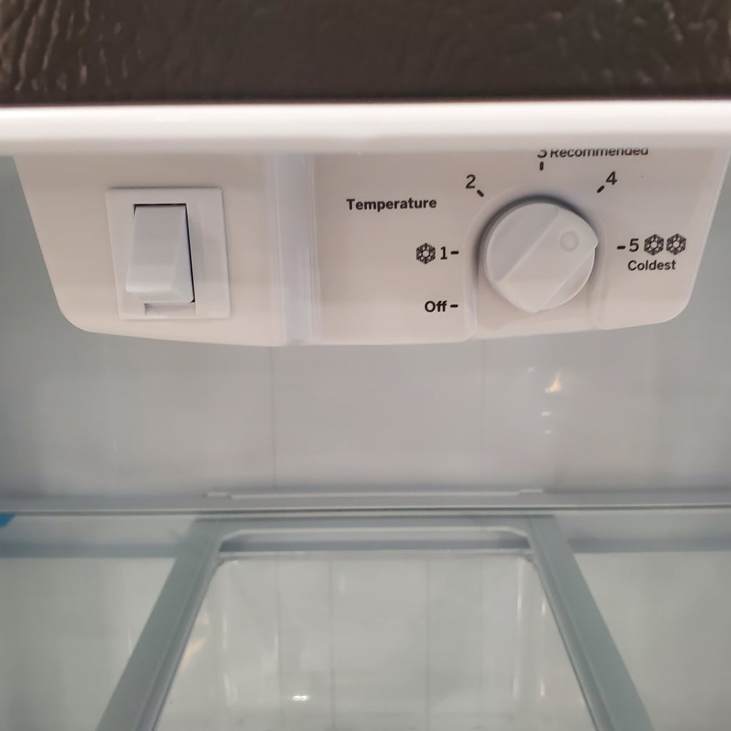 Pictures of Fingerprint Stainless Steel GE 21.9 cu. ft. Top Freezer Refrigerator with Garage Ready Technology GTS22KYNCRFS - Scratch & Dent - Minor - Neu Appliance Outlet - Discount Appliance Outlet in Austin, Tx