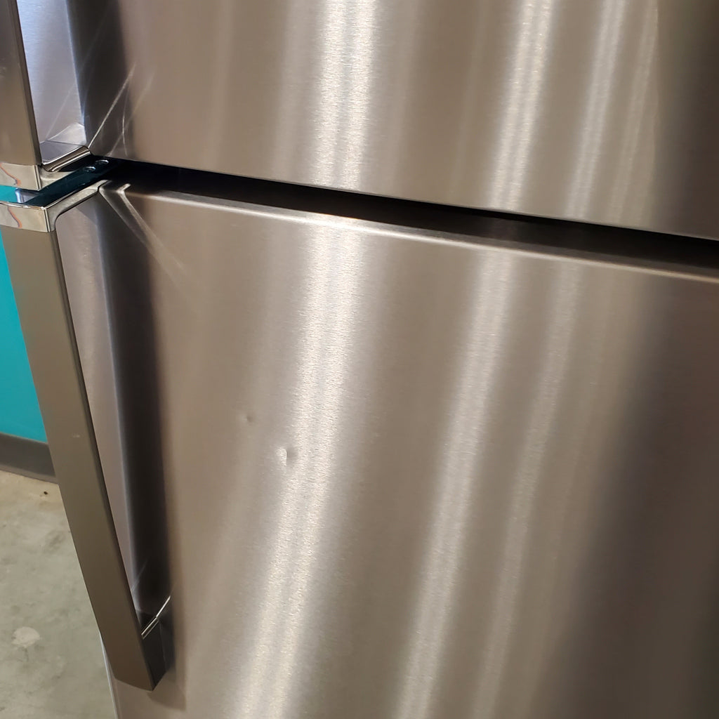 Pictures of Fingerprint Stainless Steel GE 21.9 cu. ft. Top Freezer Refrigerator with Garage Ready Technology GTS22KYNCRFS - Scratch & Dent - Minor - Neu Appliance Outlet - Discount Appliance Outlet in Austin, Tx