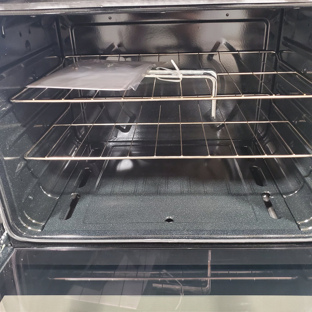 Pictures of Whirlpool Stainless 5.1 Cu. Ft. Freestanding Gas Range with Broiler Drawer and Two Speed Heat Burners WFG320M0MS - Scratch & Dent - Minor - Neu Appliance Outlet - Discount Appliance Outlet in Austin, Tx