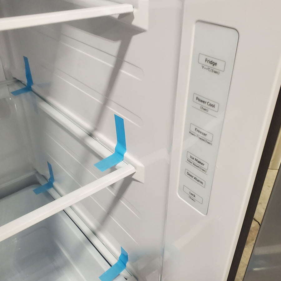 Fingerprint Resistant Stainless Steel ENERGY STAR Samsung 27.4 cu. ft. Side by Side Refrigerator with Exterior Water and Ice Dispenser RS27T5200SR - Scratch & Dent - Minor