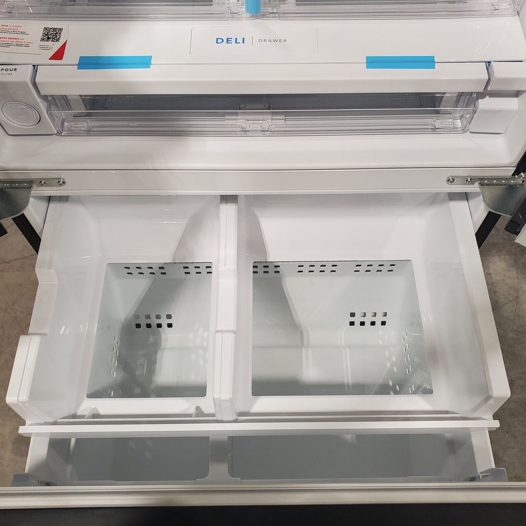 Pictures of Black Stainless Steel ENERGY STAR Frigidaire 27.8 cu. ft. 3 Door French Door Refrigerator with Exterior Water and Ice Dispenser FRFS2823AD - Scratch & Dent - Minor - Neu Appliance Outlet - Discount Appliance Outlet in Austin, Tx