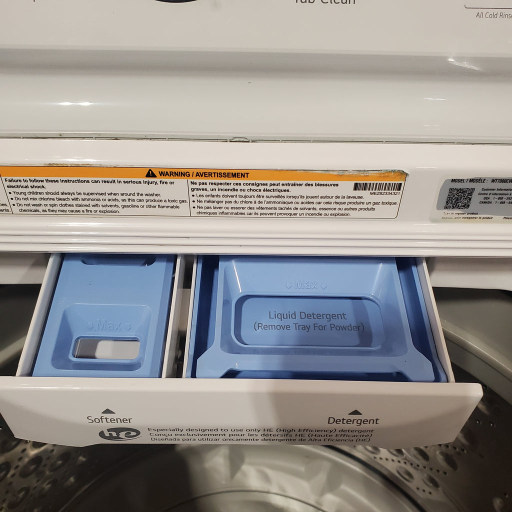 Pictures of LG White Top Load 4.5 Cu. Ft. Washer with NeveRust Drum and TurboDrum Technology WT7000CW - Certified Refurbished and LG 7.3 Cu. Ft. Electric Rear Control Ultra Large Capacity Dryer in White with Sensor Dry 16037 - DLE6100W - Certified Refurbished - Neu Appliance Outlet - Discount Appliance Outlet in Austin, Tx