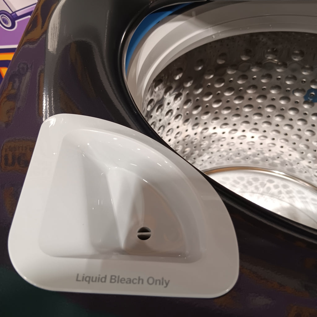 GE PTW600BPRDG White triangular bleach inside a washing machine with 'Liquid Bleach Only' text.