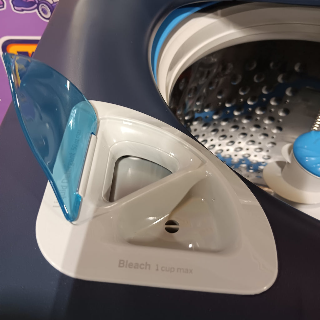 GE PTW805BPWRS Close-up of a washing machine with a blue and white detergent dispenser.