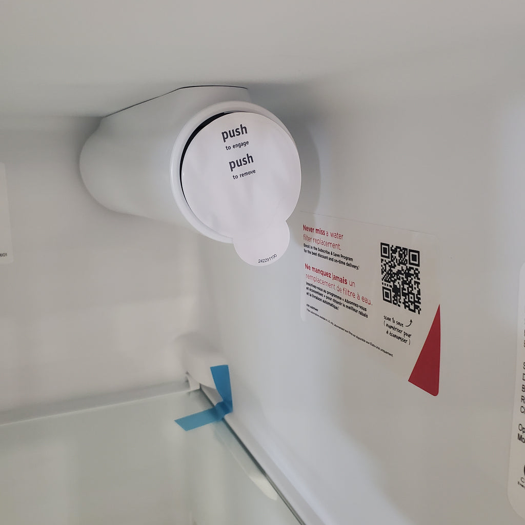 Pictures of 36 1/8" Wide White Frigidaire 25.6 cu. ft. Side by Side Refrigerator with Exterior Ice and Water Dispenser - Scratch and Dent - Minor - Neu Appliance Outlet - Discount Appliance Outlet in Austin, Tx