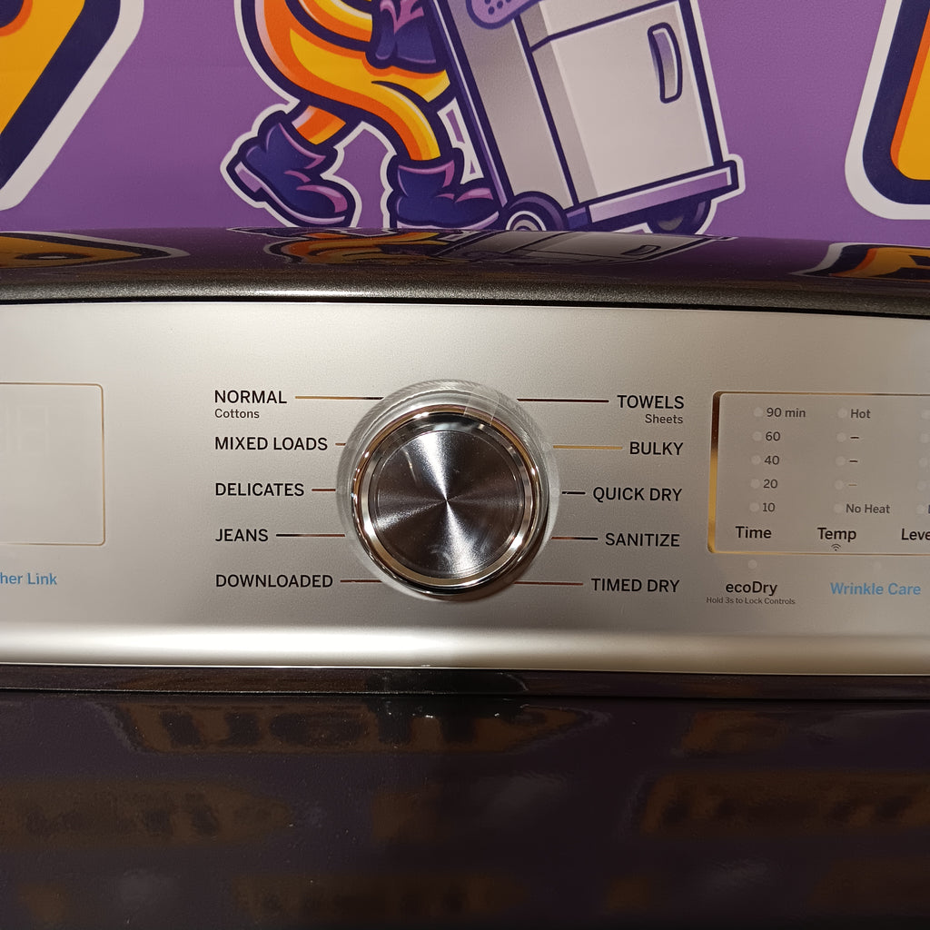 GE PTD60EBPRDG Control panel of a dryer with buttons labeled 'Normal', 'Delicates', etc., next to a colorful dryer vent.