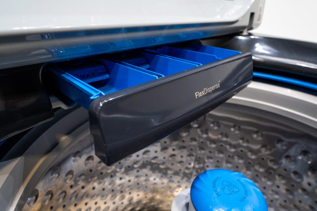 GE PTW605BPRDG Blue drawer labeled 'FlexDispense' in a washing machine