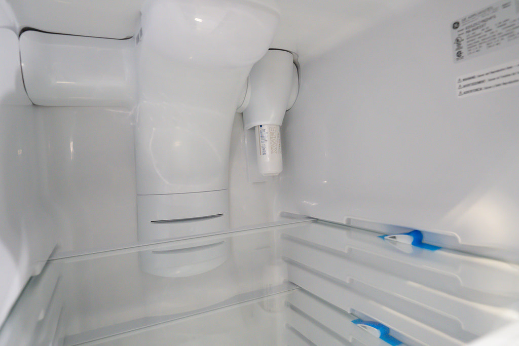 GE GSS25IYN  Water filter inside an open refrigerator