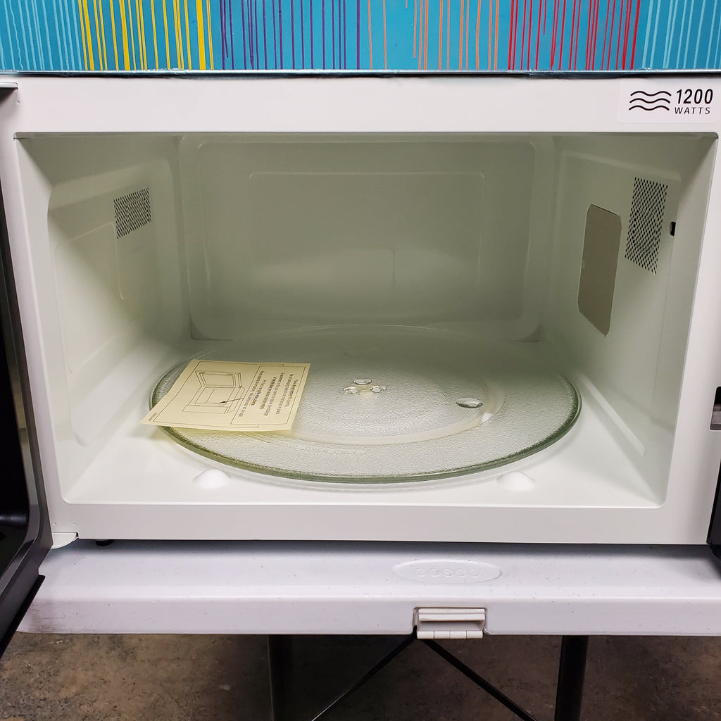 Pictures of Stainless Steel GE. 2.2 cu. ft. Countertop Microwave Oven with Inverter Defrost Technology - Scratch & Dent - Minor - Neu Appliance Outlet - Discount Appliance Outlet in Austin, Tx