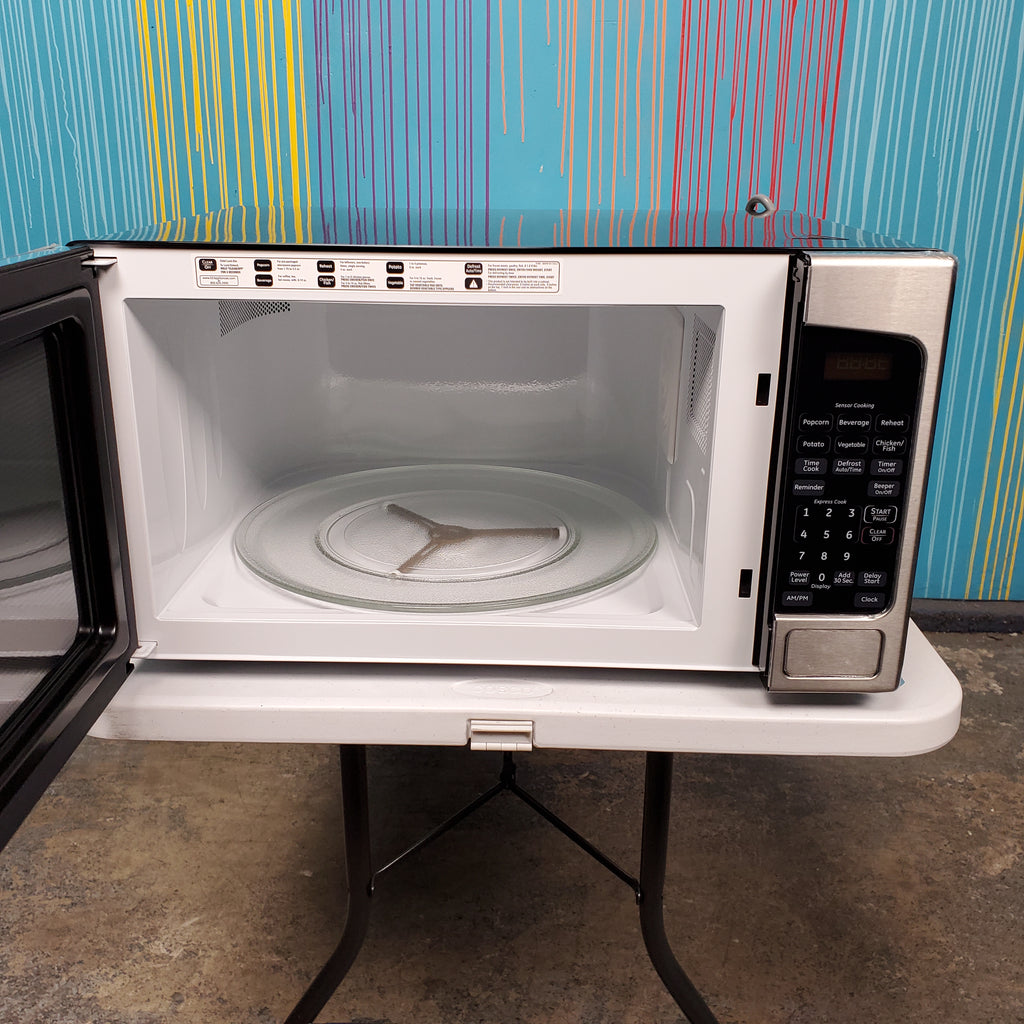 Pictures of Stainless Steel GE 2.0 cu. ft. Countertop Microwave Oven with Sensor Cooking Controls - Scratch & Dent - Minor - Neu Appliance Outlet - Discount Appliance Outlet in Austin, Tx