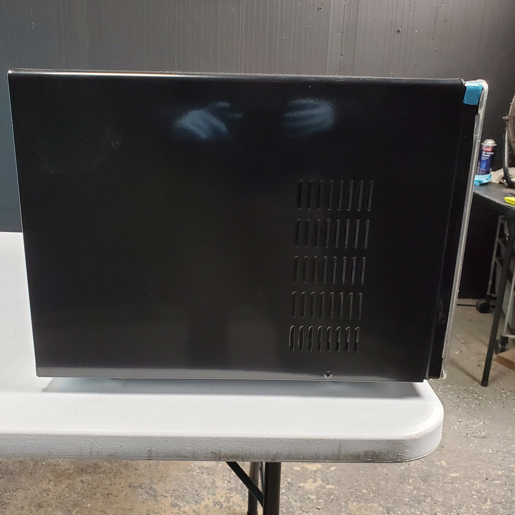 Pictures of Stainless Steel GE 2.0 cu. ft. Countertop Microwave Oven with Sensor Cooking Controls - Scratch & Dent - Minor - Neu Appliance Outlet - Discount Appliance Outlet in Austin, Tx