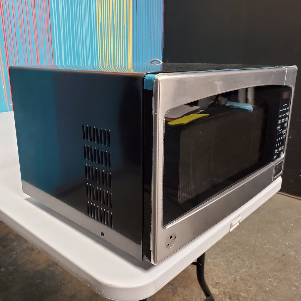 Pictures of Stainless Steel GE 2.0 cu. ft. Countertop Microwave Oven with Sensor Cooking Controls - Scratch & Dent - Minor - Neu Appliance Outlet - Discount Appliance Outlet in Austin, Tx