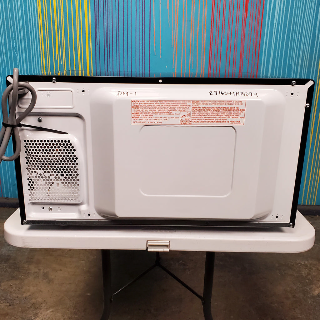 Pictures of Stainless Steel GE 2.0 cu. ft. Countertop Microwave Oven with Sensor Cooking Controls - Scratch & Dent - Minor - Neu Appliance Outlet - Discount Appliance Outlet in Austin, Tx