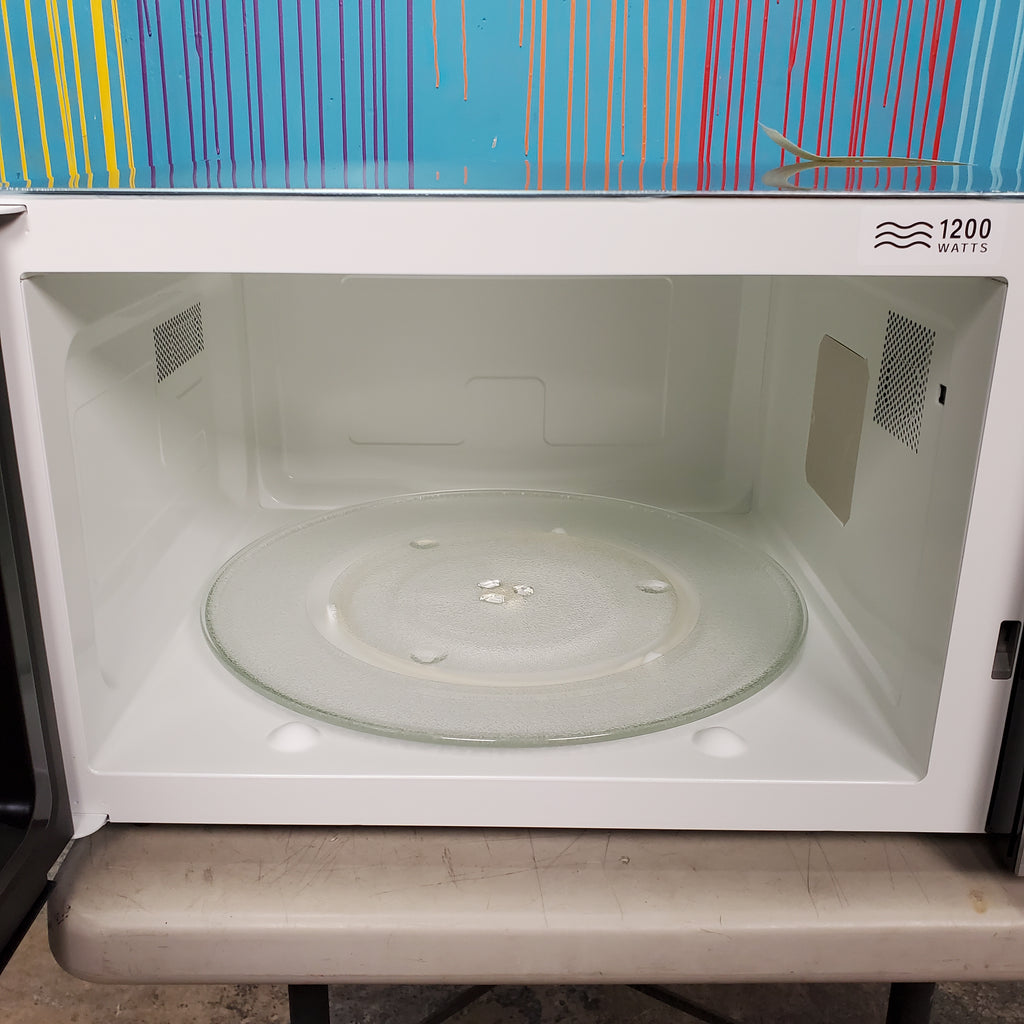 Pictures of Stainless Steel GE. 2.2 cu. ft. Countertop Microwave Oven with Inverter Defrost Technology - Scratch & Dent - Minor - Neu Appliance Outlet - Discount Appliance Outlet in Austin, Tx