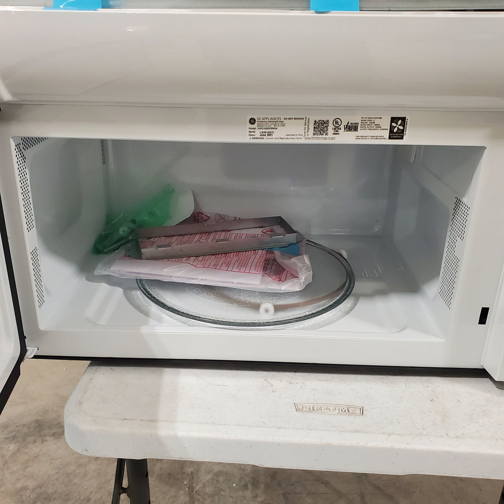 Pictures of White GE 1.6 cu. ft. Over the Range Microwave with 13.5 inch Defrost Options - Open Box - Neu Appliance Outlet - Discount Appliance Outlet in Austin, Tx