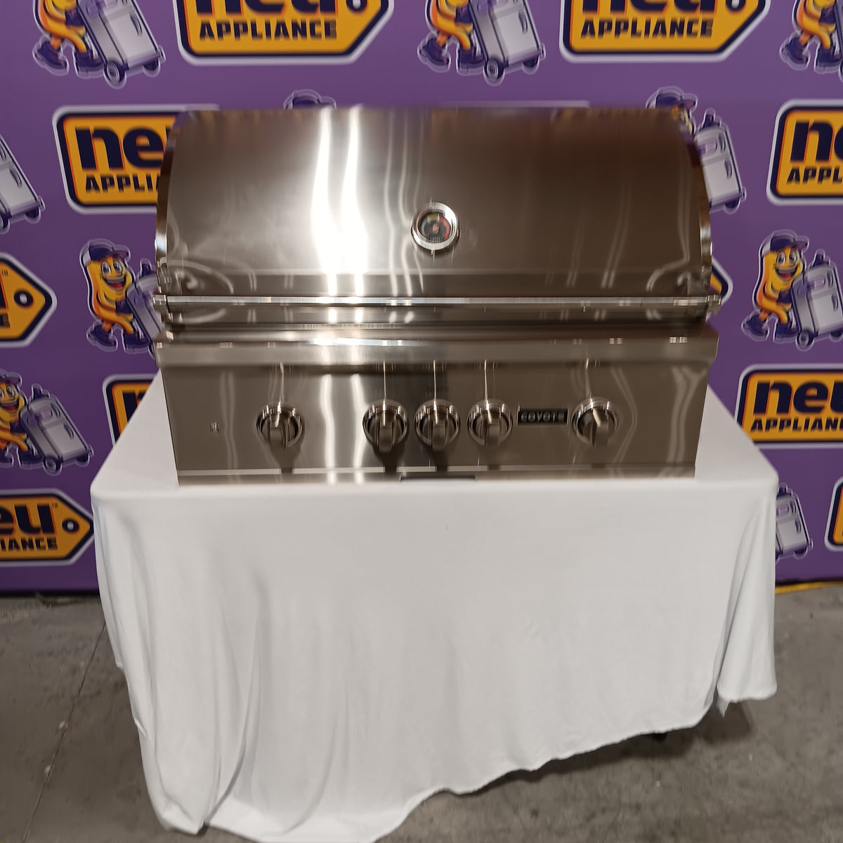 Coyote 36 Inch Built-In Grill with 3 Infinity Burners™, RapidSear™ Infrared Burner, 875 sq. in. Cooking Surface, Interior Grill Lighting, LED Illuminated Knobs, and Integrated Wind Guard C2SL36NG - Scratch & Dent (Moderate)