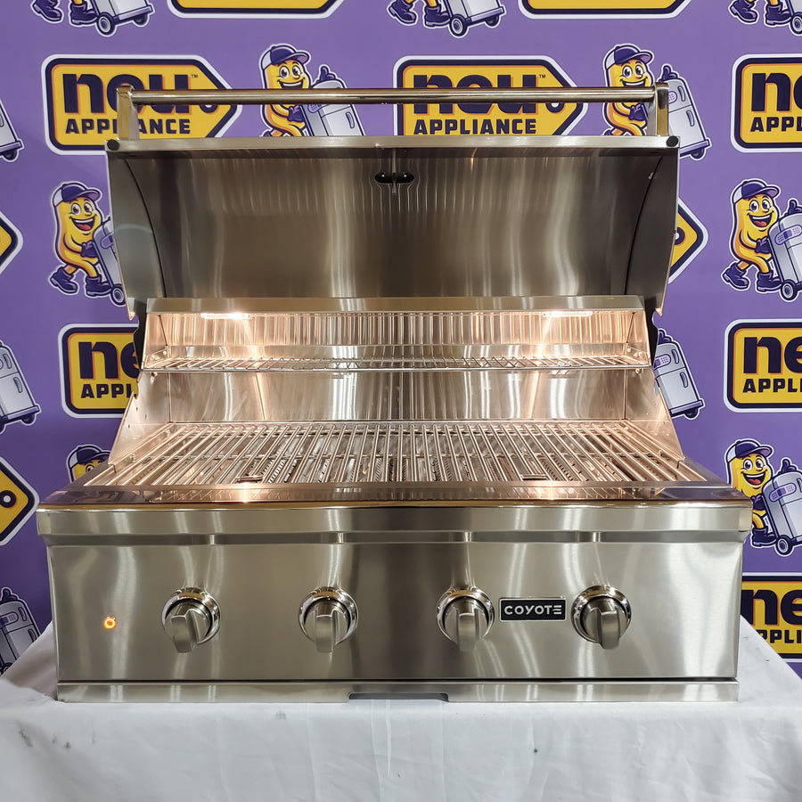 Coyote 36 Inch Built-In Grill with 4 Infinity Burners™, 875 sq. in. Cooking Surface, Interior Grill Lighting and Integrated Wing Guard C2C36NG - Open Box
